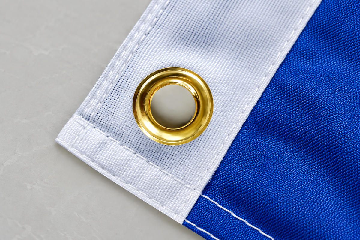 Close-up of a metal grommet on the flag
